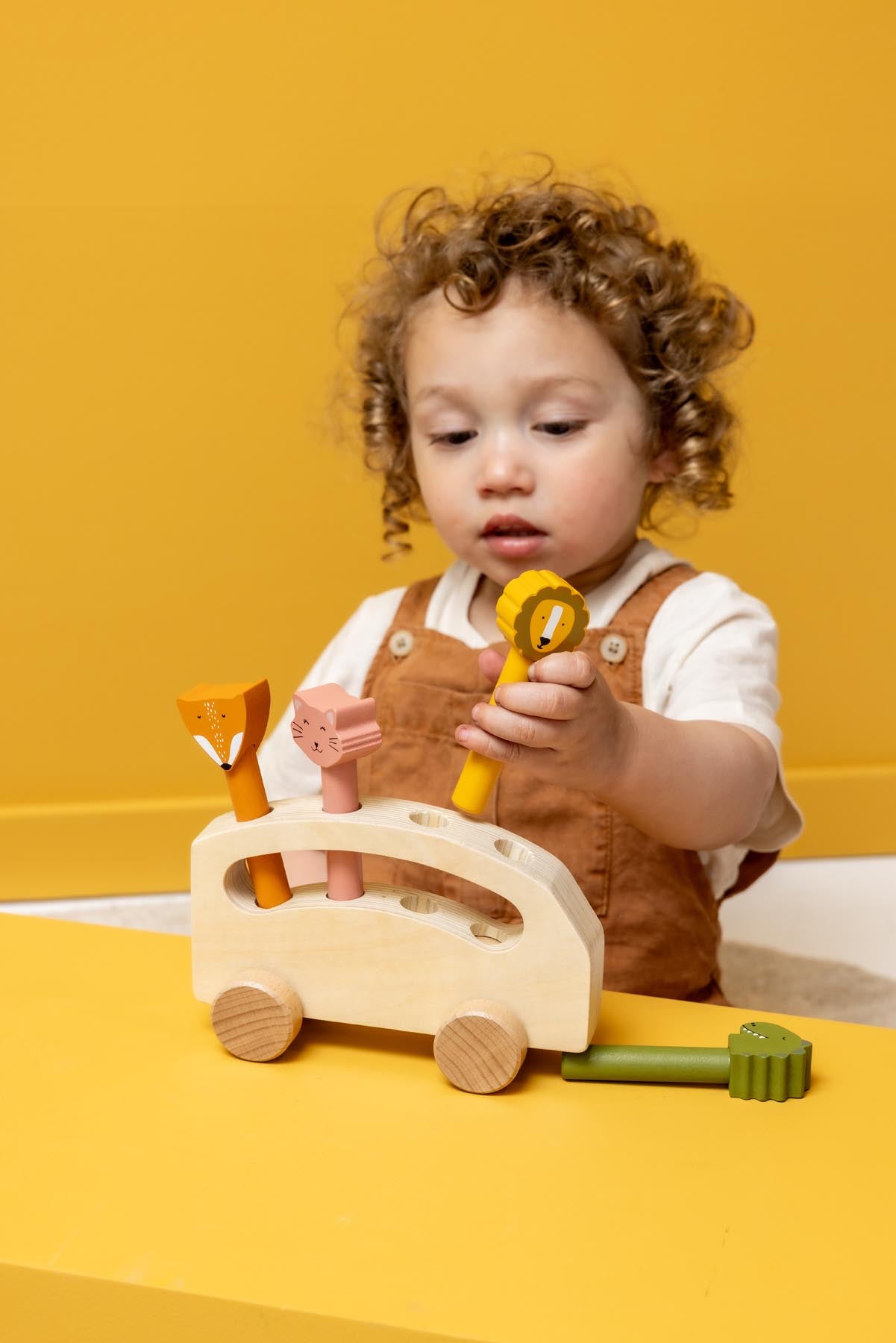 Wooden pop-up animal bus