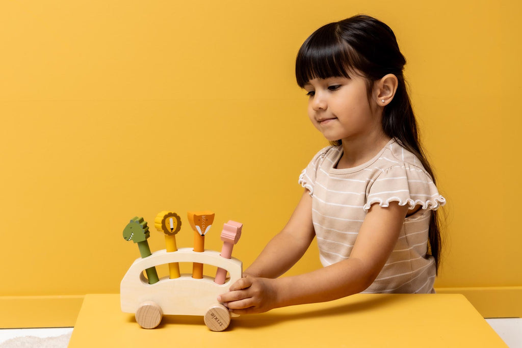 Wooden pop-up animal bus