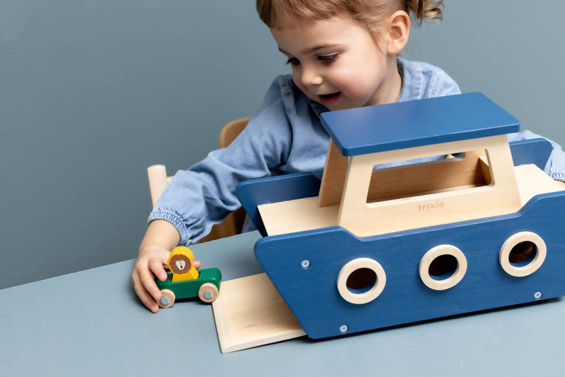Trixie playtime with wooden ferry boat
